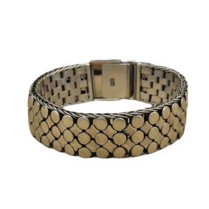 Sterling silver link bracelet. 3 rows of circles and 2 rows of rectangles.